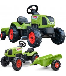 Žalias pedalais minamas Claas traktorius su priekaba